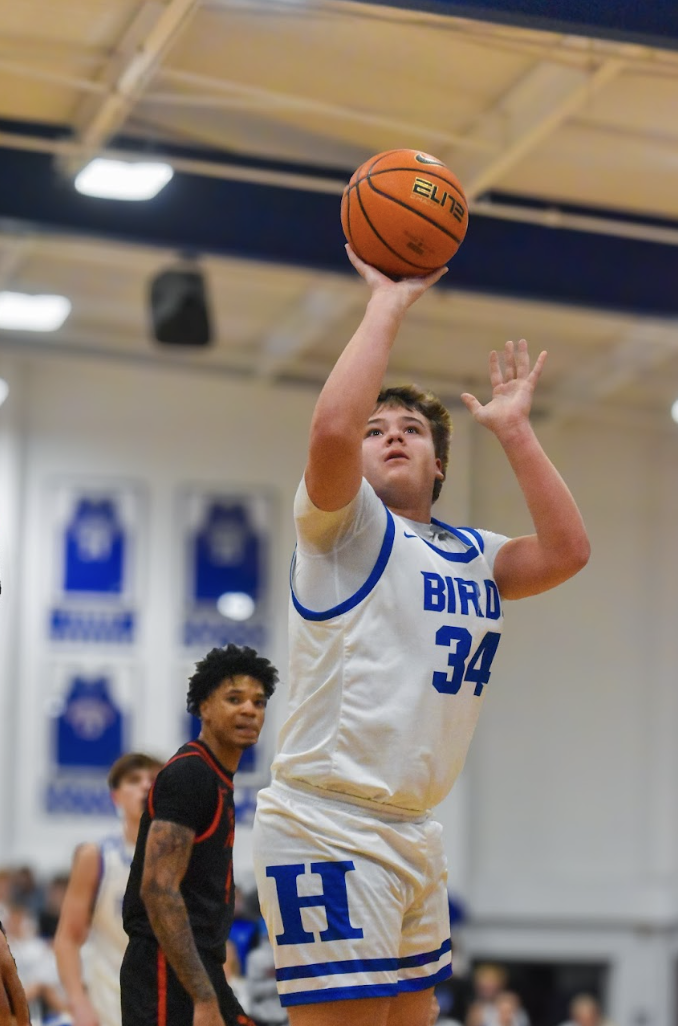 Tayden Lorenzen (10) shoots an open mid-range shot. 